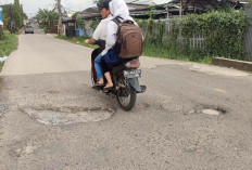 Lubang Jalan Bikin Spot Jantung Berdetak Kencang