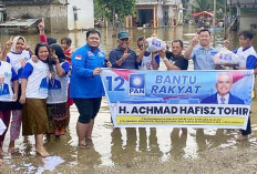 Hafisz Tohir Bagikan Sembako Korban Banjir di Muratara