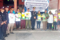 Polres Salurkan Bantuan Beras di Desa Pangkul