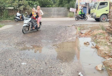 Jalan Tergenang Air Pertanda Jalan Akan Rusak