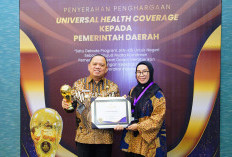 Pj Bupati H Sandi Terima Penghargaan UHC Awards 2024 