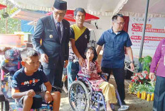 Salurkan Bantuan Terhadap Warga Penyandang Disabilitas