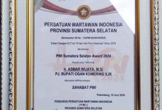 Pj Bupati OKI Terima Penghargaan Sahabat PWI