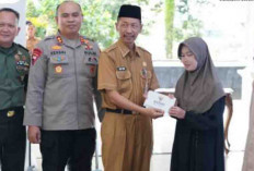 HUT ke-25, Baznas Muara Enim Salurkan Sembako