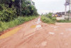 Akses Jalan Bumara Regency 2 Licin dan Berlubang Besar