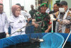 Panen Ikan Patin dan Penanaman Bibit Palawija 