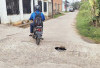 Lubang Jalan Jadi Ancaman Pengendara Motor