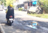 Lubang di Jalan Enim Cukup Besar