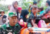 Respons Cepat TNI, Warga Terdampak Banjir OKI Dievakuasi ke Tempat Aman