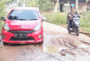 Lubang Besar di Jalan Gogokan Kito Mulai Rusak